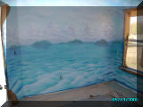 mural artist James Labadie - Kids Pirate Ship mural seascape background, left side